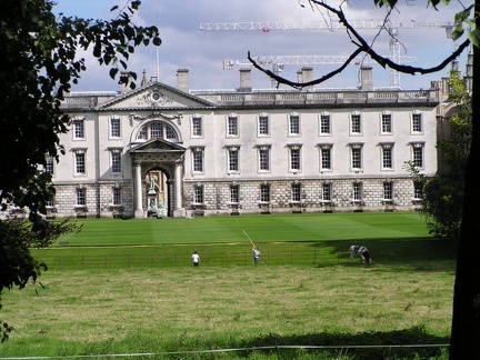 Cambridge University. Notice the cow on the field in front of the school.