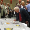 Gene Goodrick signing the wing panel.