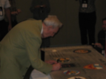 Gene Voiland signing the wing panel.