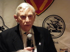 Brigadier General (Retired) J. Kemp McLaughlin speaking to the group at the banquet