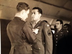 LTC Buck presenting a medal to Joseph L. Cicci