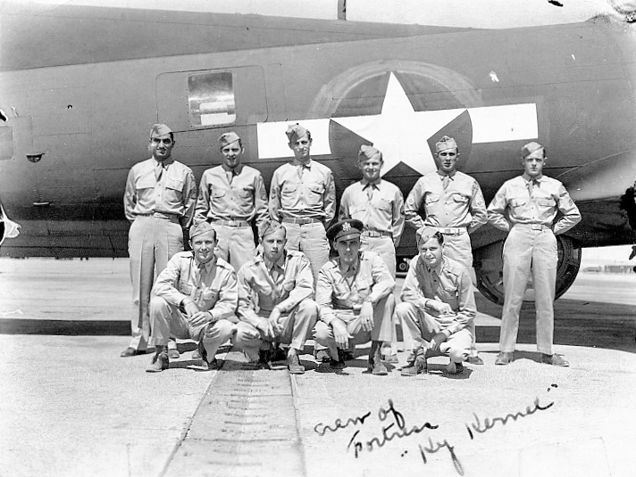 Back, left to right: S/Sgt G. W. Rotondi (R), S/Sgt F. L. White (Asst Engr), S/Sgt H. D. Gager (2nd Radio), T/Sgt Felix R. Dowsley (Engr), S/Sgt Wm. Brown (BT), S/Sgt Ralph E. Pierce (TG)
Front, left to right: Lt J. M. Wilson (B), Lt J. E. Morgan (CP), Lt J. B. Caoughlin (N), Lt W. A. Jones (P) 20273_KyKernel_Groupa_712x535.jpg